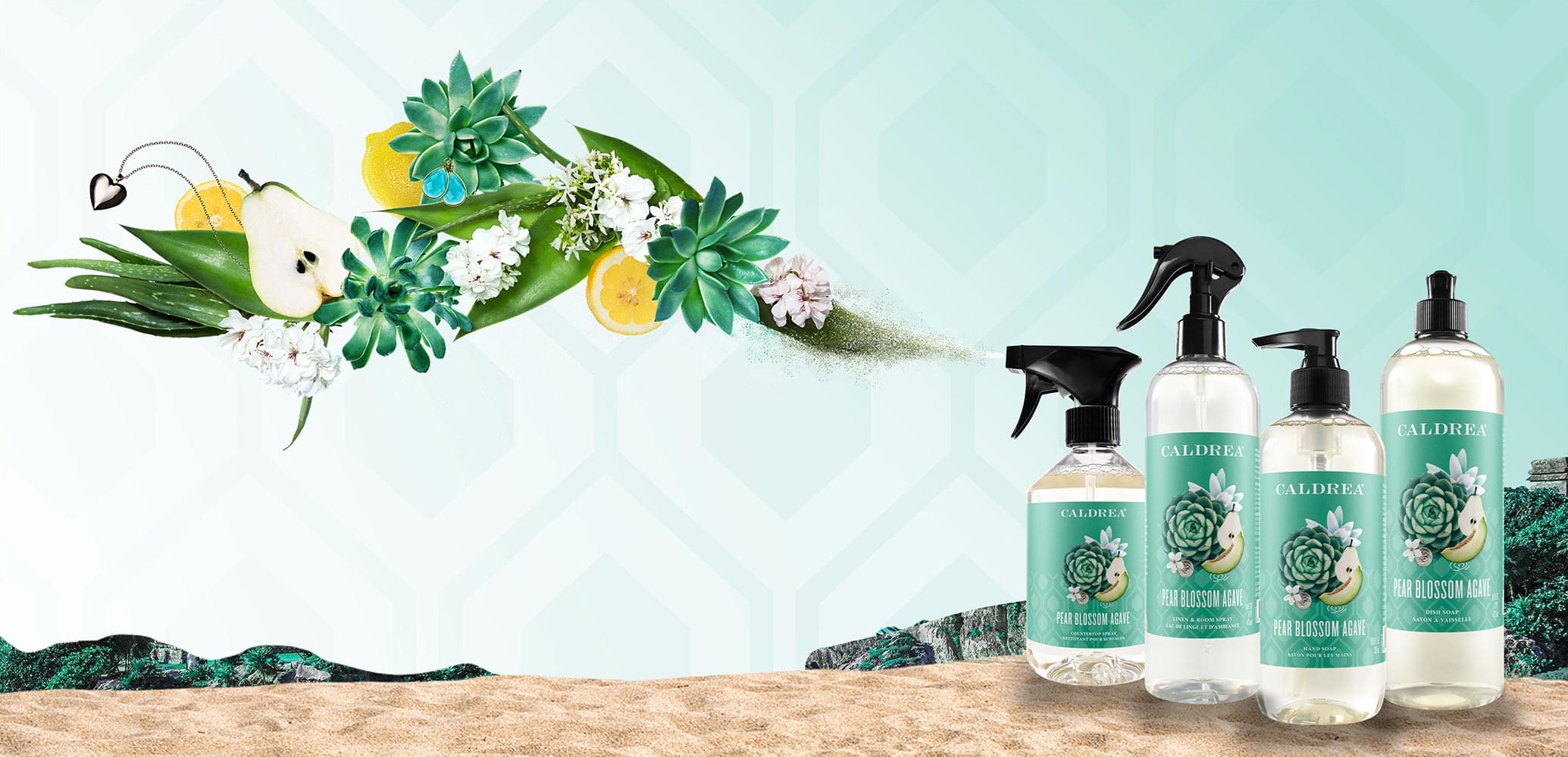 A collection of countertop spray, dish soap, and more spray out elements that encompass our scent: Pear Blossom Agave.