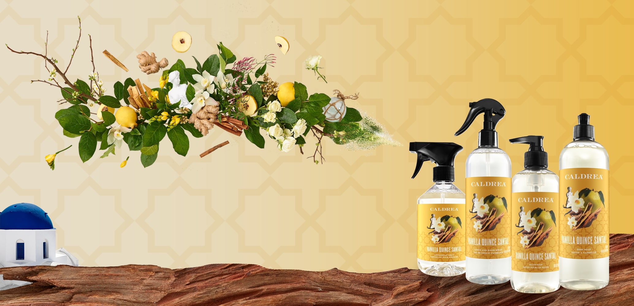 A collection of countertop spray, dish soap, and more spray out elements that encompass our scent: Vanilla Quince Santal.